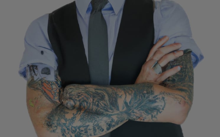real estate agent with tatoos